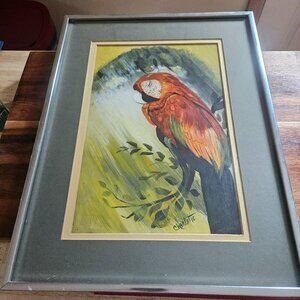 painting of a macaw perched on a branch vibrant orange yellow signed Charlotte